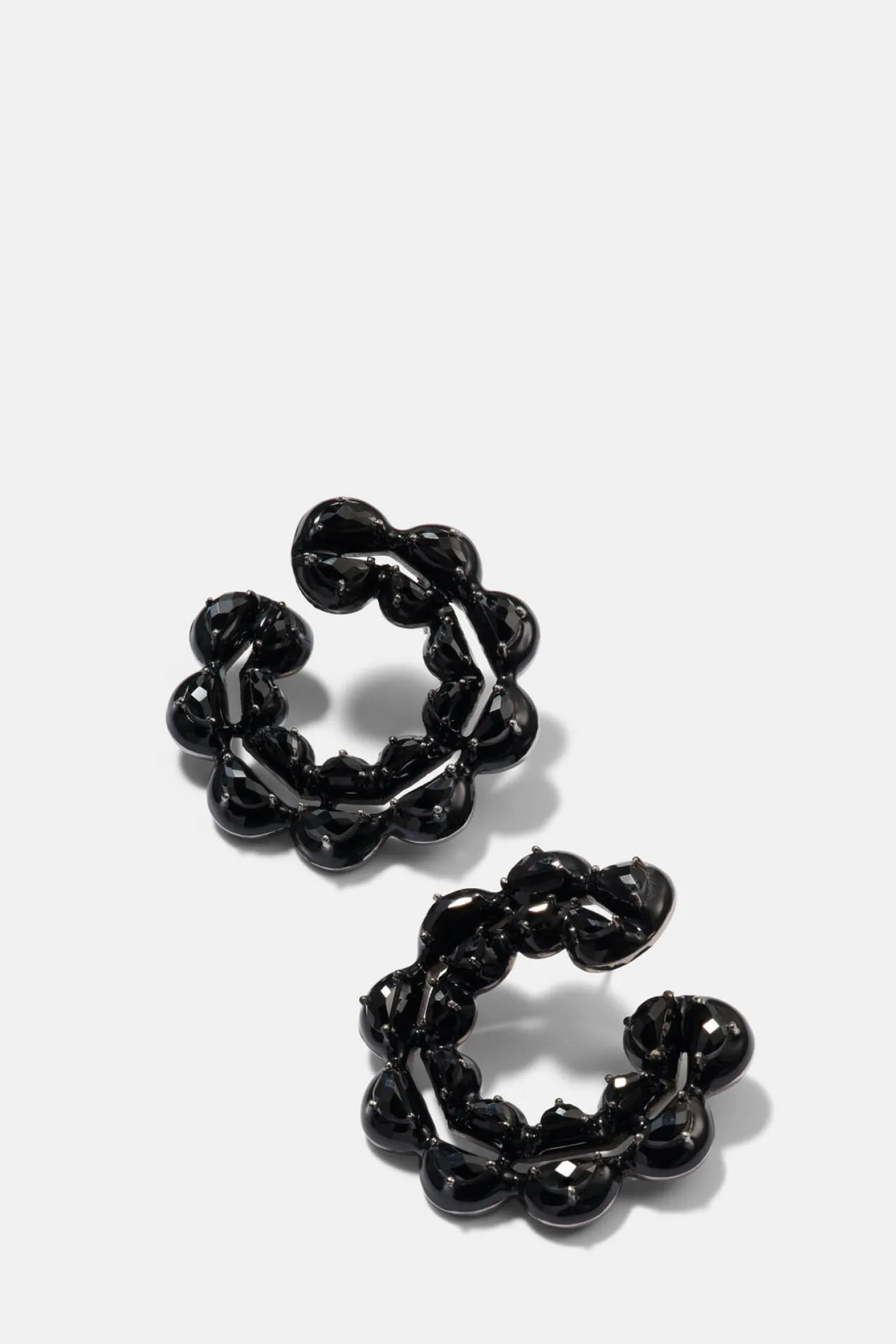 caterpillar_black_enamele_0.webp Caterpillar Black Enameled Bypass Hoops - Black Spinel