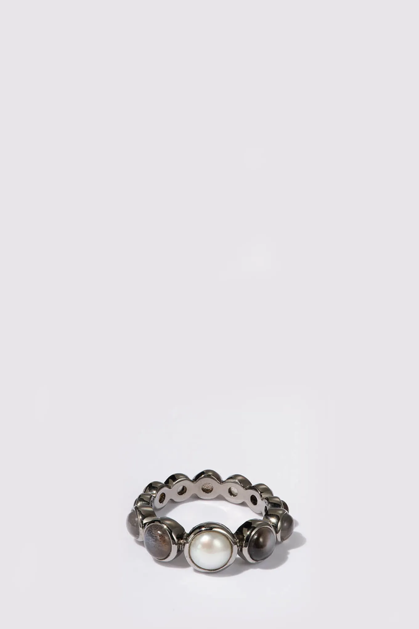 graduated_dot_ring__pearl_0.webp Graduated Dot Ring - Pearl & Black Sheen Moonstone